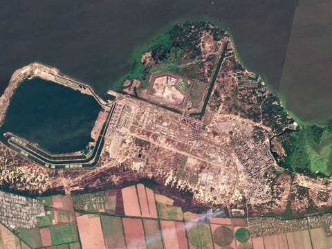 This composite of satellite images taken by Planet Labs PBC shows smoke rising from fires at the Zaporizhzhia nuclear power plant in southeastern Ukraine on Thursday, Aug. 25, 2022.