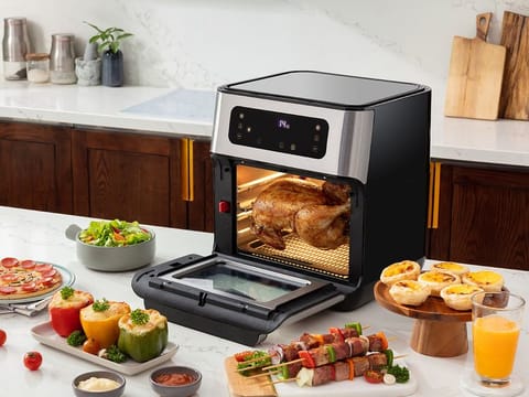 An air fryer toaster oven can transform a full-sized rotisserie chicken into an evenly cooked, juicy, crispy meal you won't forget.