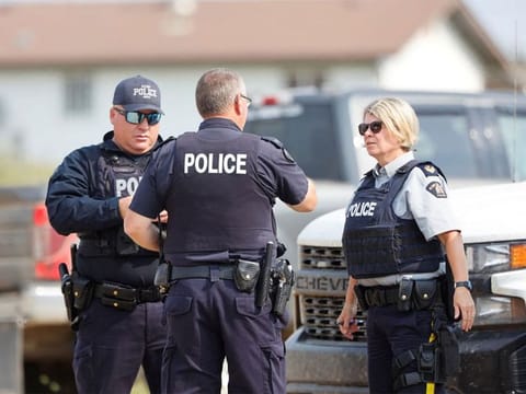 Police were investigating the motive and whether there was a connection between the victims and the male suspect, who has not been named.
