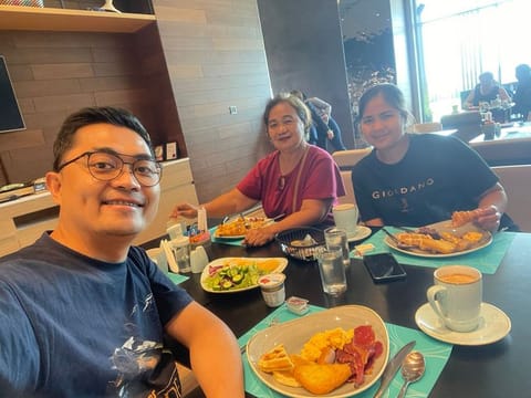 Cris Gudia with his mother after their reunion in Dubai