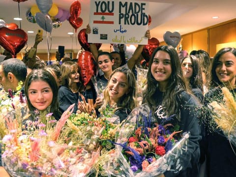 Members of the Lebanese dance group Mayyas arrive at Beirut International Airport on September 16, 2022 after winning the "America's Got Talent" TV contest.