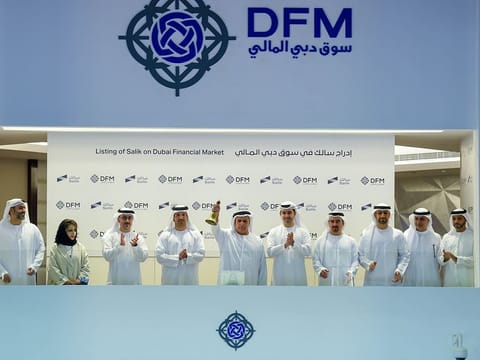 Mattar Al Tayer, director-general and chairman of the Board of Executive Directors of the RTA ring the bell to celebrate the listing of Salik at Dubai Financial Market.