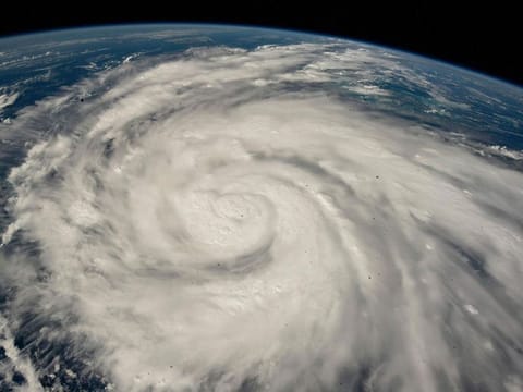 Hurricane Ian pictured from the International Space Station just south of Cuba gaining strength and heading toward Florida, on September 26, 2022. Hurricane Ian rapidly intensified off Florida's southwest coast on September 28, gaining top winds of 250 kmph, just shy of the most dangerous Category 5 status.