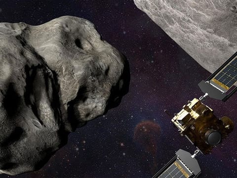 Illustration of NASA’s DART spacecraft and the Italian Space Agency’s (ASI) LICIACube prior to impact at the Didymos binary system.