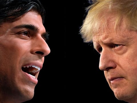 In this combination of file pictures created in London on October 21, 2022, Britain's Prime Minister Boris Johnson (R), listens to a question from the media as he attends a press conference at Downing Street in London on March 7, 2022, and Britain's Chancellor of the Exchequer Rishi Sunak (L) speaking at the annual Conservative Party Conference being held at the Manchester Central convention centre on October 4, 2021.