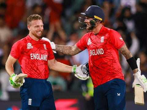 England’s skipper Jos Buttler (left) and Alex Hales celebrate after the T20 World Cup cricket semifinal win against India in Adelaide, Australia, on November 10, 2022. England defeated India by ten wickets.