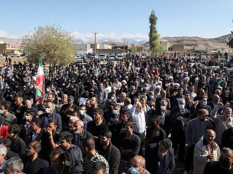 Iranians at the funeral procession of people killed in a shooting attack, in the city of Izeh in Iran's Khuzestan province, on November 18, 2022.