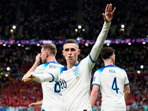 Star man... England's Phil Foden waves to the fans after scoring his side's second goal during the World Cup group B match against Wales, at the Ahmad Bin Ali Stadium in Al Rayyan, Qatar.