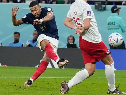 Kylian Mbappe scores France’s second goal against Poland in the FIFA World Cup Qatar 2022 Round of 16 match at the Al Thumama Stadium in Doha, Qatar, on December 4, 2022. Mbappe leads the scoring chart with five goals.