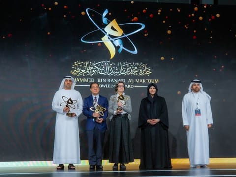 Sheikha Latifa bint Mohammed bin Rashid Al Maktoum standing with the winners of the seventh Mohammed bin Rashid Al Maktoum Knowledge Award at a ceremony on Tuesday in Dubai