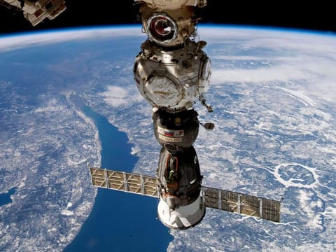 This undated handout photo taken by Russian cosmonaut Sergei Korsakov and released by Roscosmos State Space Corporation shows a Soyuz capsule of the International Space Station (ISS).