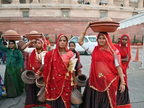 Traditional food makers from Karnataka and Rajasthan leave after preparing various millet delicacies for Parliamentarians at Parliament House, in New Delhi on Tuesday, Dec 20, 2022.