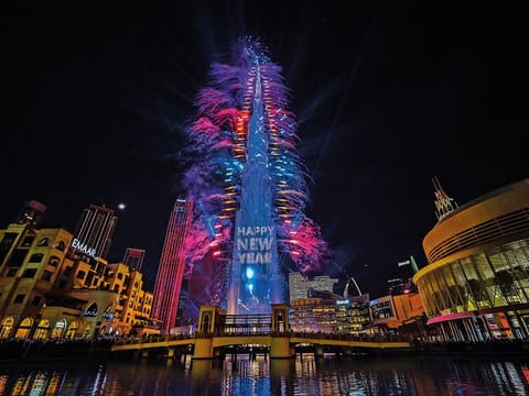 New Year's Eve light show illuminates the landmark Burj Khalifa tower at midnight in Dubai (from January 1, 2023).