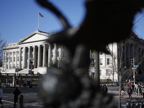 The Federal Reserve's preferred inflation measures eased in November while consumer spending stagnated, suggesting the central bank's interest-rate hikes are helping to cool both price pressures and broader demand, with more tightening on the way.