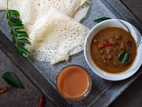 Neer means water and the dosa gets this name because the recipe uses plenty of water to make it thin and soft with a porous surface.