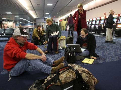 A rare snowstorm blanketed the Las Vegas Valley today, delaying flights, causing widespread fender-benders and leading to the cancellation of several events