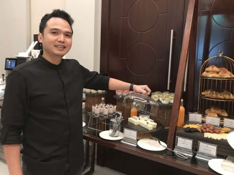 Filipino expatriate Russel Reyes Tuazon, who won the Dh15 million grand prize of Emirates Draw, worked in a hotel in Dubai.