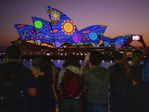 Kamilaroi artist Rhonda Sampson’s ‘Diyan Warrane’ artwork is projected onto the sails of the Sydney Opera House at dawn during Australia Day 2023 celebrations in Sydney, January 26, 2023.