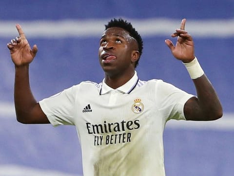 Real Madrid's Brazilian forward Vinicius Junior celebrates after scoring his team's third goal during the Copa del Rey (King's Cup), quarter final against Club Atletico de Madrid at the Santiago Bernabeu stadium in Madrid on January 26, 2023.