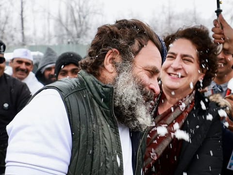 Congress leader Rahul Gandhi and party's general secretary Priyanka Gandhi Vadra share a light moment after hoisting the tricolour flag, at the party office, in Srinagar on Monday, January 30, 2023.