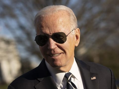 US President Joe Biden speaks to members of the media on the South Lawn of the White House in Washington, DC, on Monday.