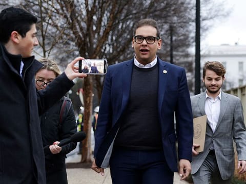 U.S. Rep. George Santos (R-NY) leaves the Capitol Hill Club as members of the press follow him on January 31, 2023 in Washington, DC. Amid ongoing investigations into his finances, campaign spending and false statements on the campaign trail, Santos is reportedly recusing himself from his House committee assignments.