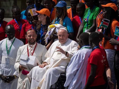 Pope Francis meets with a group of the Catholic faithful from the town of Rumbek, who had walked for more than a week to reach the capital, after he addressed clergy at the St. Theresa Cathedral in Juba, South Sudan Saturday, Feb. 4, 2023.