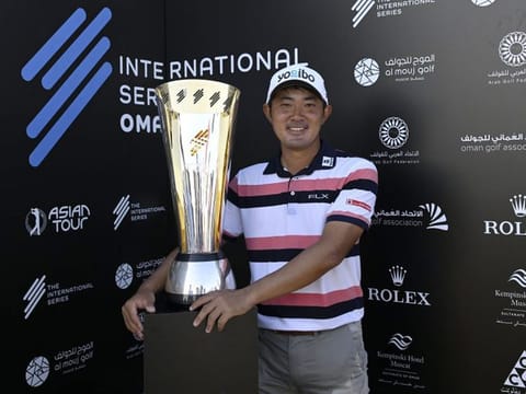 Winner of the International Series - Oman, Takumi Kanaya (Japan) with the tournament trophy