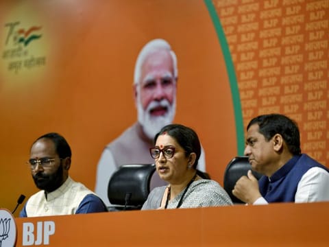 Federal Minister of Women and Child Development and Minority Affairs Smriti Irani addresses a press conference on Billionaire investor George Soros's remarks on Prime Minister Narendra Modi, at the Bharatiya Janata Party (BJP) Headquarters, in New Delhi on Friday.