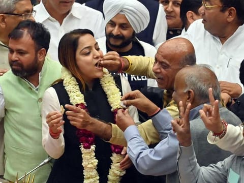 Aam Aadmi Party (AAP) Mayor candidate Shelly Oberoi with party members celebrate after getting elected as Delhi Mayor with 150 votes, at Civic Centre, in New Delhi on Wednesday, February 22, 2023.