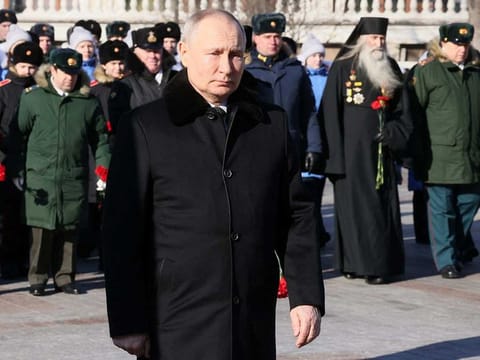 Russian President Vladimir Putin attends a wreath laying ceremony at the Tomb of the Unknown Soldier by the Kremlin Wall on the Defender of the Fatherland Day in Moscow, Russia, February 23, 2023.