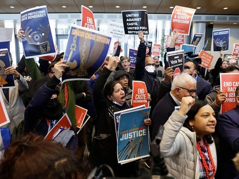 Supporters and opponents of a proposed ordinance to add caste to Seattle's anti-discrimination laws protest at a rally at Seattle City Hall, Tuesday, Feb. 21, 2023, in Seattle. Council Member Kshama Sawant proposed the ordinance.
