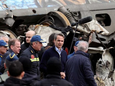 Greek Prime Minister Kyriakos Mitsotakis visits the site of a crash, where two trains collided, near the city of Larissa, Greece, March 1, 2023.
