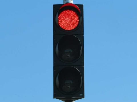 Jumping a red signal is extremely dangerous. For illustrative purposes only.