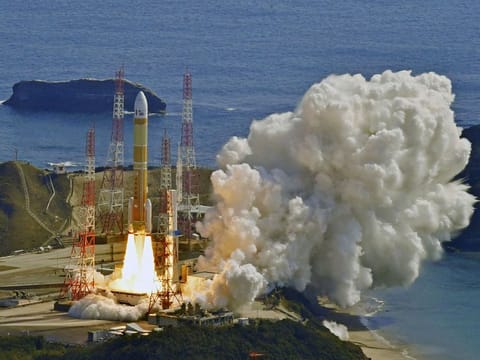 An aerial view shows an H3 rocket carrying a land observation satellite lift off from the launching pad at Tanegashima Space Center on the southwestern island of Tanegashima, Kagoshima Prefecture, southwestern Japan March 7, 2023, in this photo taken by Kyodo.