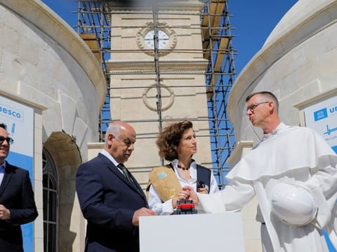 Unesco's Director-General Audrey Azoulay stands near the church during the bell ringing on her visit to the old city of Mosul, Iraq, March 7, 2023.