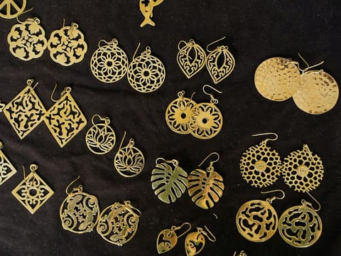 Jewelry made from bullet shells are displayed at Angkor Bullet Jewelry in Phnom Penh, Cambodia, on March 29, 2023.