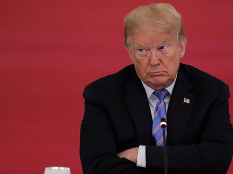 A file photo of former US President Donald Trump taken during a meeting of the American Workforce Policy Advisory Board in the East Room at the White House in Washington, U.S., June 26, 2020.