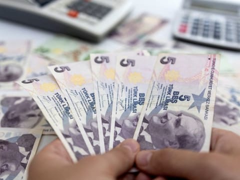 The central bank will exempt lenders from holding some lira-denominated government bonds if lira deposits make up 60 per cent or more of their total deposits.