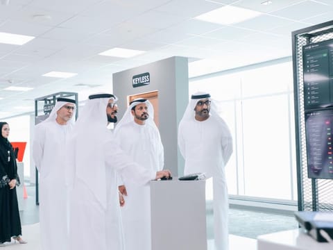 Police chief Maj Gen Al Shamsi (second from right) being briefed during his visit