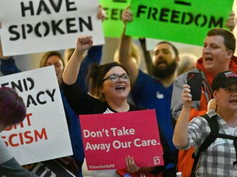 Protesters outside the Kentucky Supreme Court chambers rally in favour of abortion rights as the court heard arguments whether to temporarily pause the state's abortion ban in Frankfort.