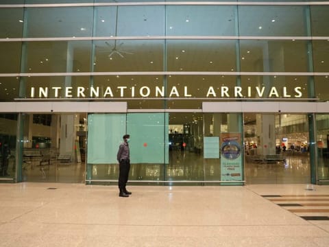 Airport Security Force (ASF) personnel at the International arrivals area at Islamabad International Airport, Pakistan. Photo taken on May 5, 2020.