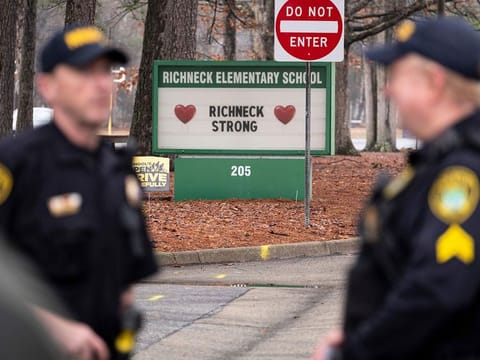 A grand jury in Virginia has indicted the mother of a 6-year-old boy who shot his teacher on charges of child neglect and failing to secure her handgun in the family's home.