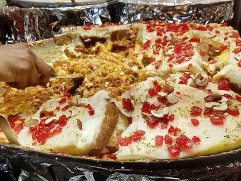 Hot and succulent shahi tukda served with homemade mango ice-cream is a must have.
