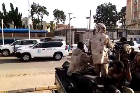 A grab taken from an AFPTV video shows a convoy leaving Khartoum towards Port Sudan, on April 23, 2023, as people flee the battle-torn Sudanese capital.