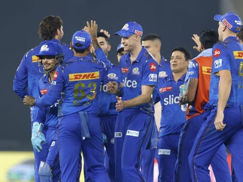 Mumbai Indians players celebrates the wicket of Hardik Pandya during their IPL match on Tuesday. Mubai bowlers failed to capitlise on the advantage and gave away too many runs for their comfort in the end.