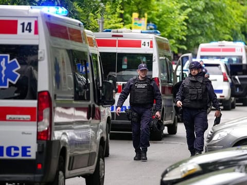 Police block streets around the Vladislav Ribnikar school in Belgrade, Serbia, Wednesday, May 3, 2023.