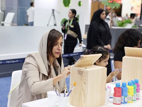 Sheikha Bodour Al Qasimi during her engagement in the art workshop