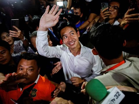 Move Forward Party leader and prime ministerial candidate, Pita Limjaroenrat, waves to the crowd during the general election in Bangkok, Thailand, May 14, 2023.