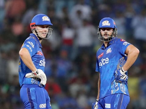 Cameron Green and Tim David of the Mumbai Indians during the Tata Indian Premier League match against the Lucknow Super Giants at the Bharat Ratna Shri Atal Bihari Vajpayee Ekana Cricket Stadium, Lucknow, on May 16, 2023. The duo were unable to take Mumbai to the victory that would have brought them closer to a playoff spot.